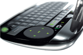 Illustration for article titled Logitech DiNovo Mini Wireless Keyboard Controls Windows Media Center and PS3